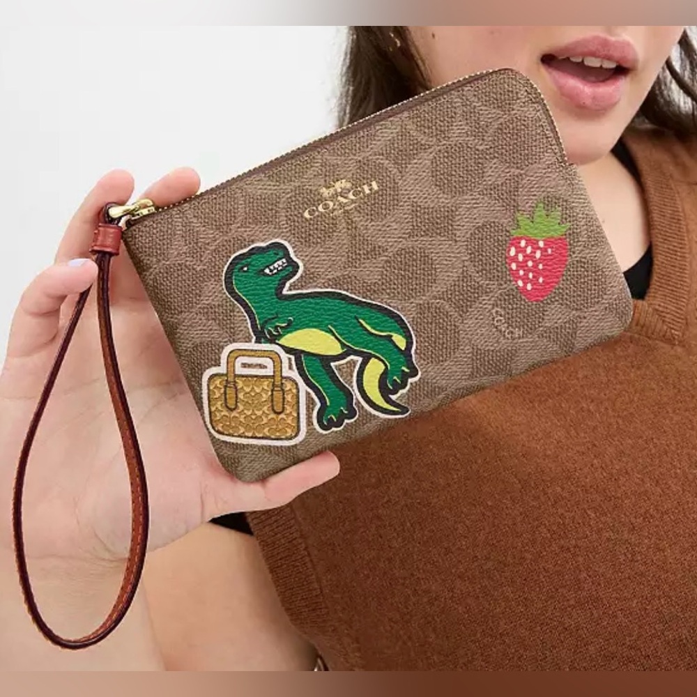 Coach Dinosaur Wristlet